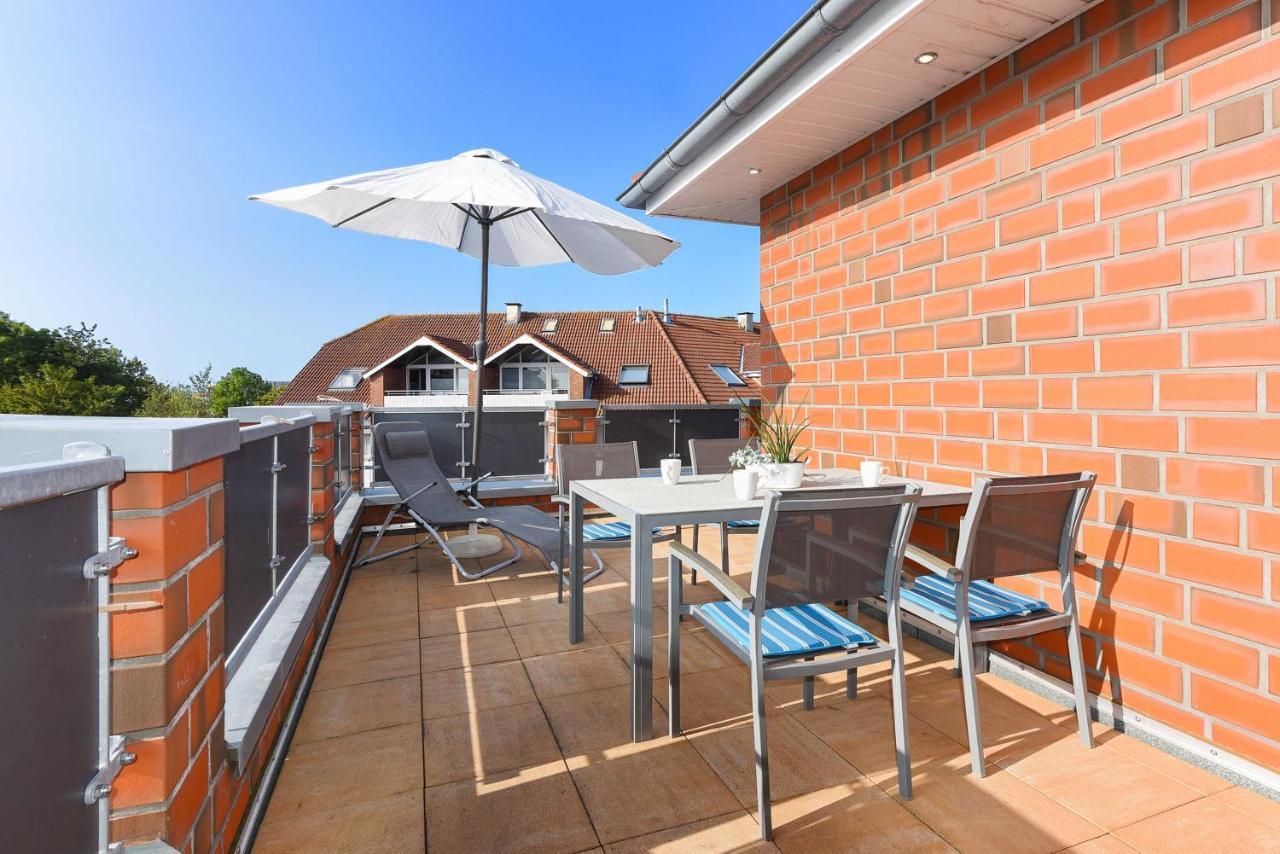 Haus Leuchtturm Apartment Bensersiel Exterior photo
